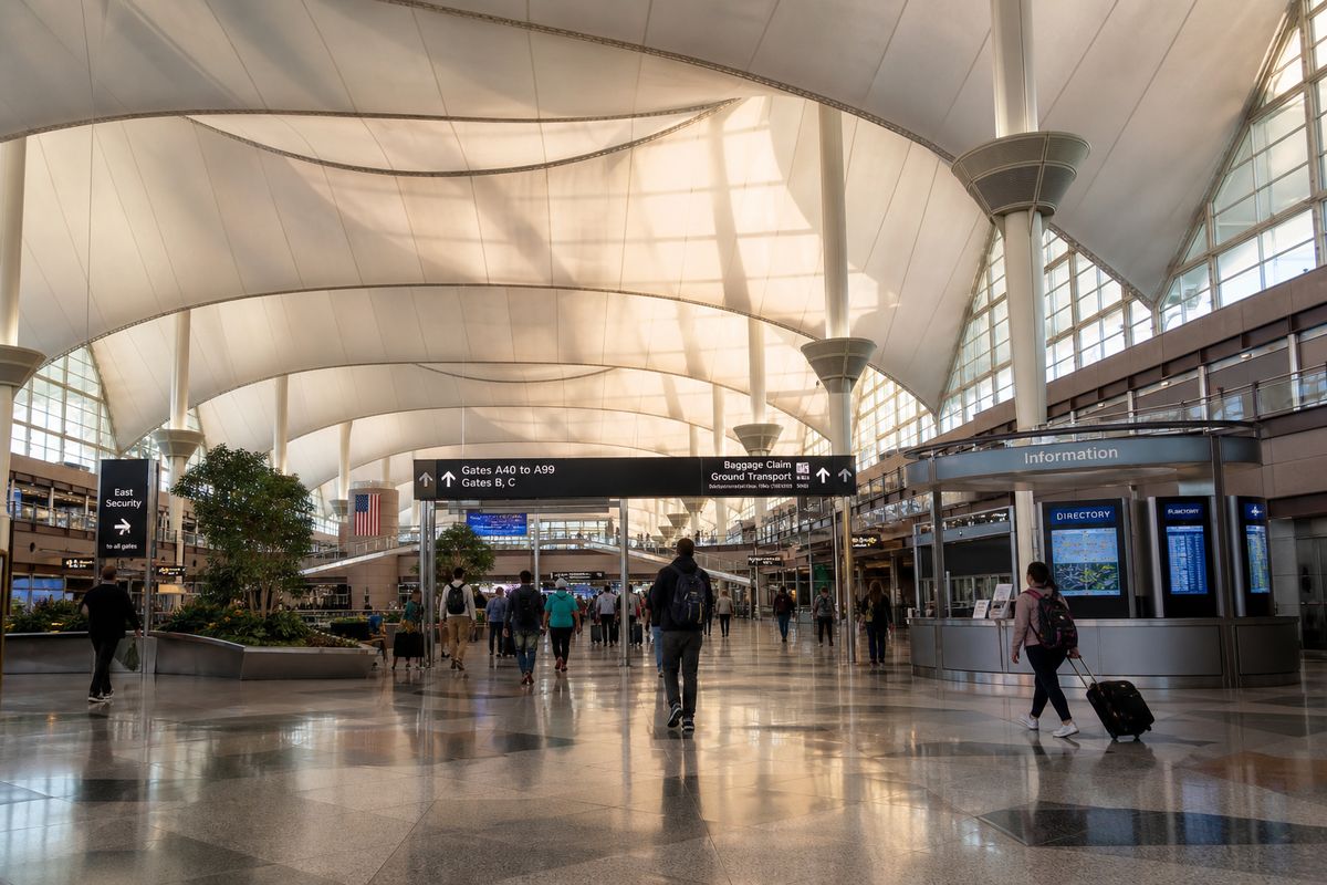 Denver International Airport terminal at sunrise
