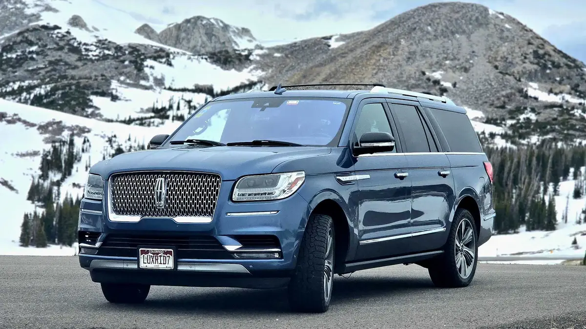 Arion luxury SUV on Colorado mountain road — student transportation