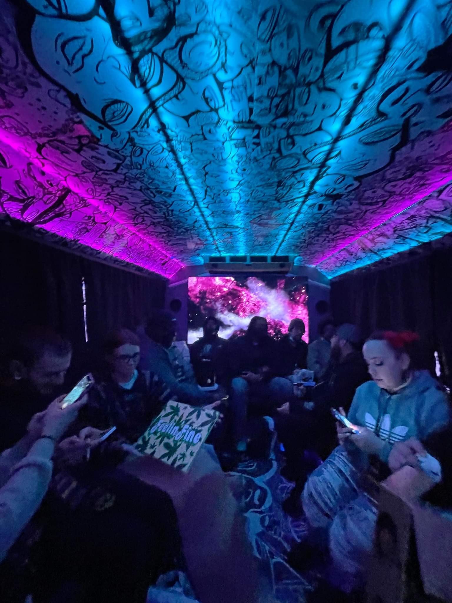 Arion Party Bus interior — wrap-around seating with LED lighting and entertainment system