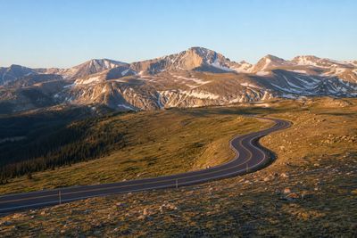 Trail Ridge Road curving across alpine tundra in Rocky Mountain National Park at sunrise